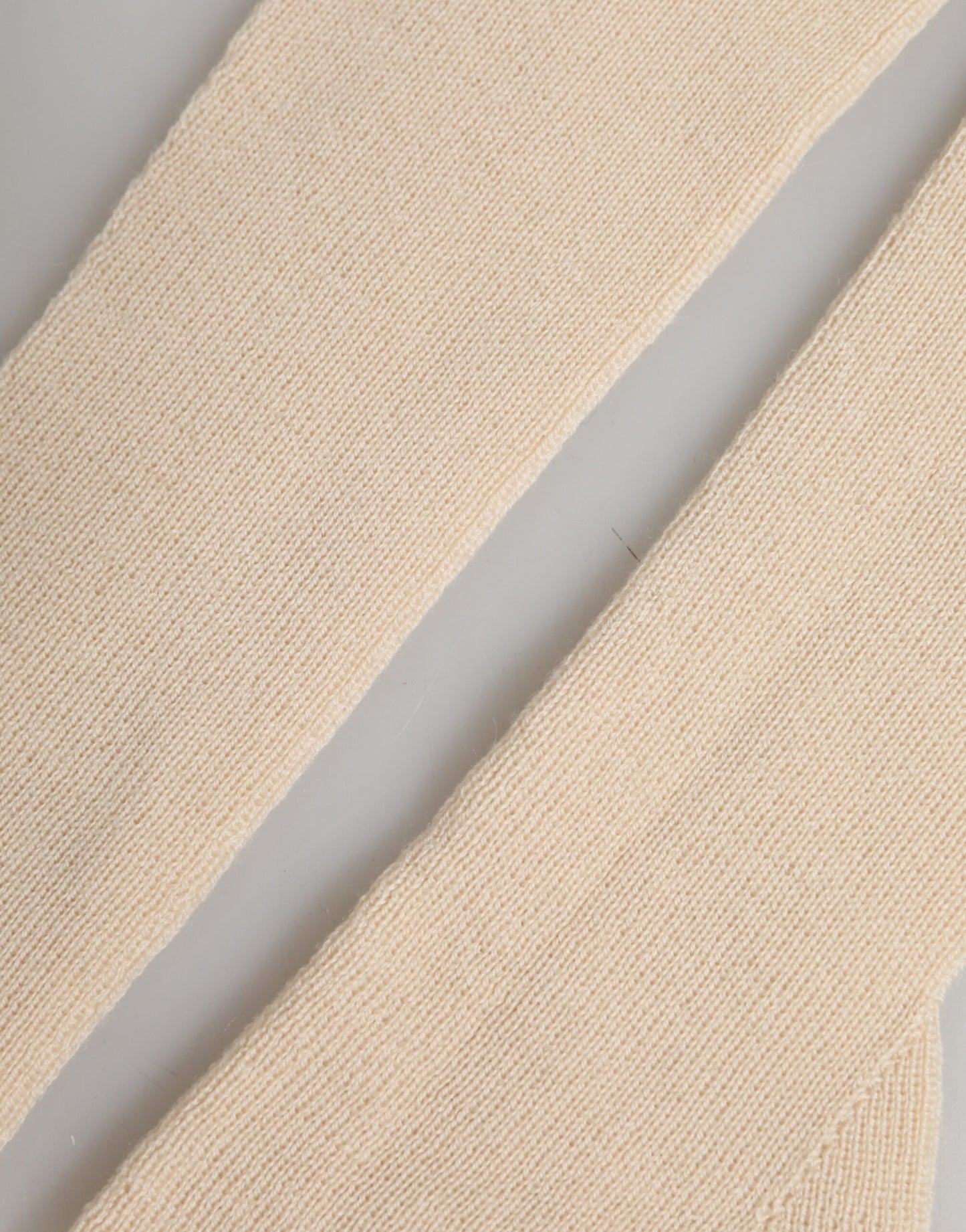 Dolce & Gabbana Beigefarbene Fingerlose Damen-Armstulpen aus Wolle