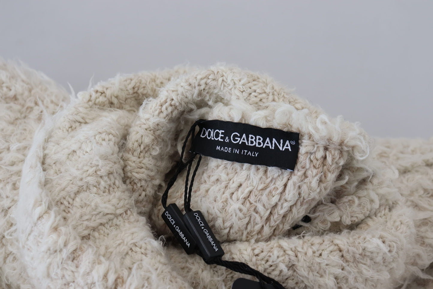 Dolce & Gabbana Rollkragenpullover aus cremefarbenem Wollstrick