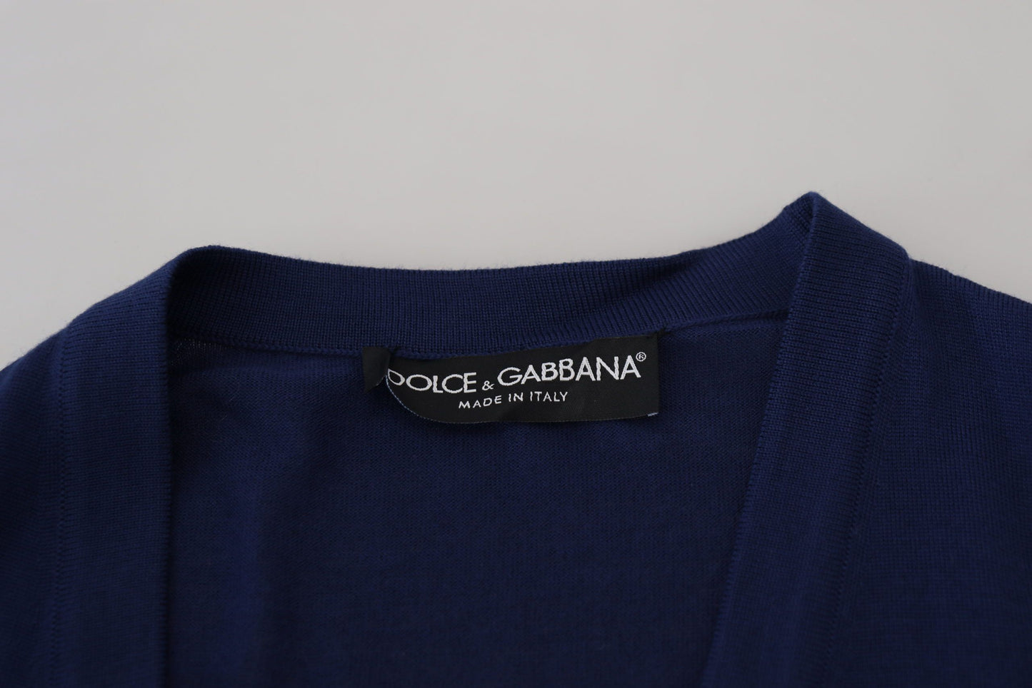 Dolce & Gabbana Blaue Wollstrickjacke mit V-Ausschnitt und Knopfleiste