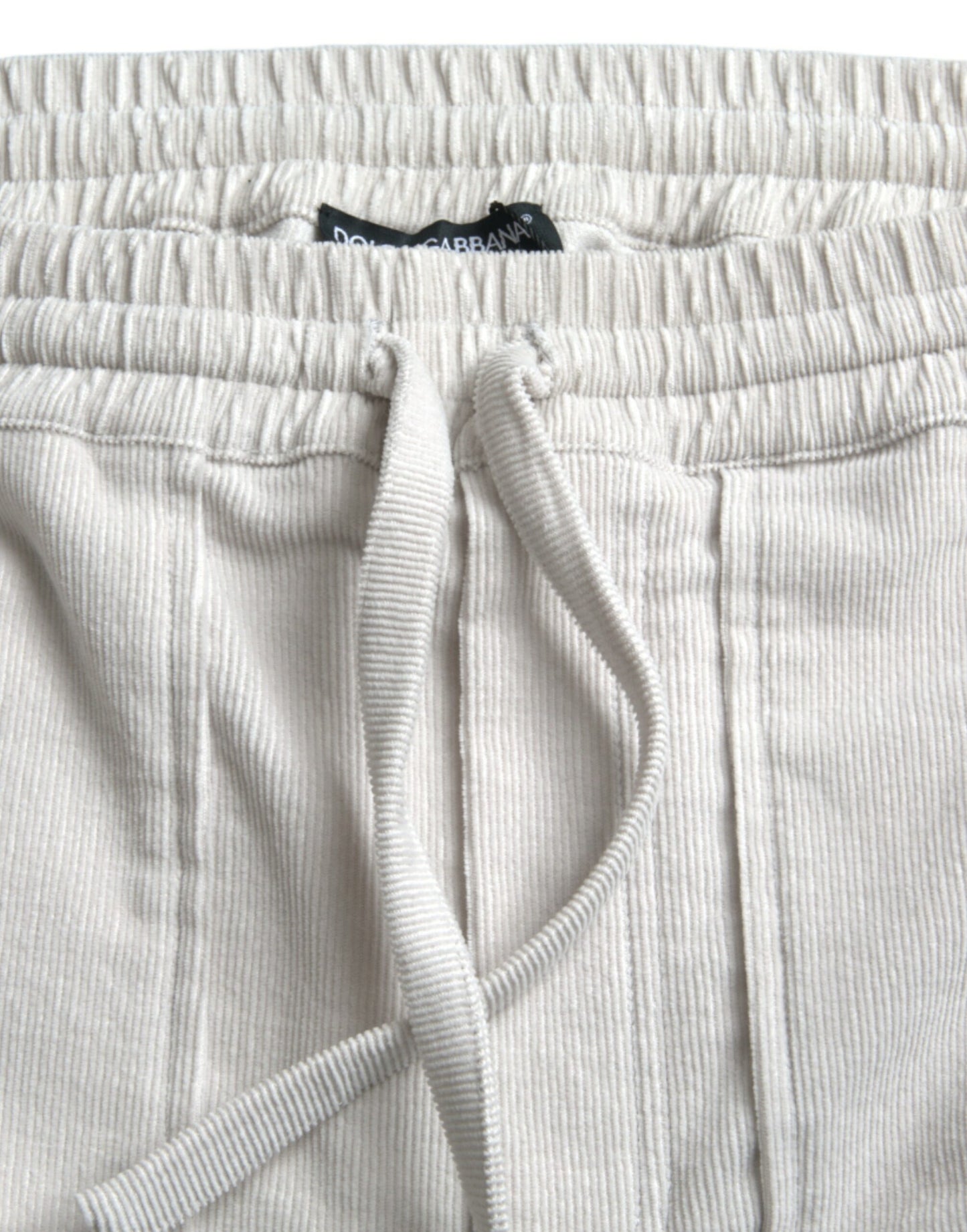 Dolce & Gabbana Beigefarbene Logo-Bermuda-Shorts aus Baumwollcord