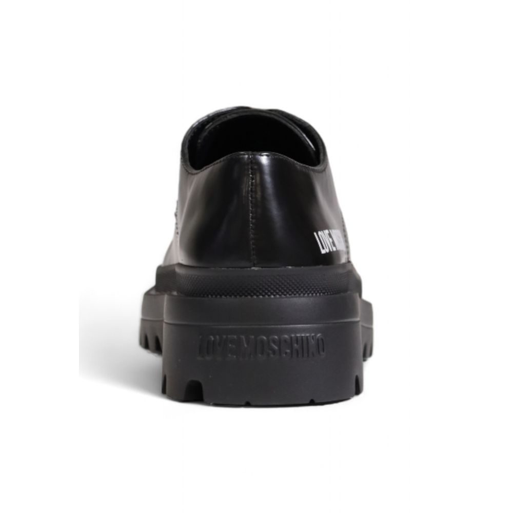 Love Moschino Schwarze Polyethylen-Plateau-Pumps