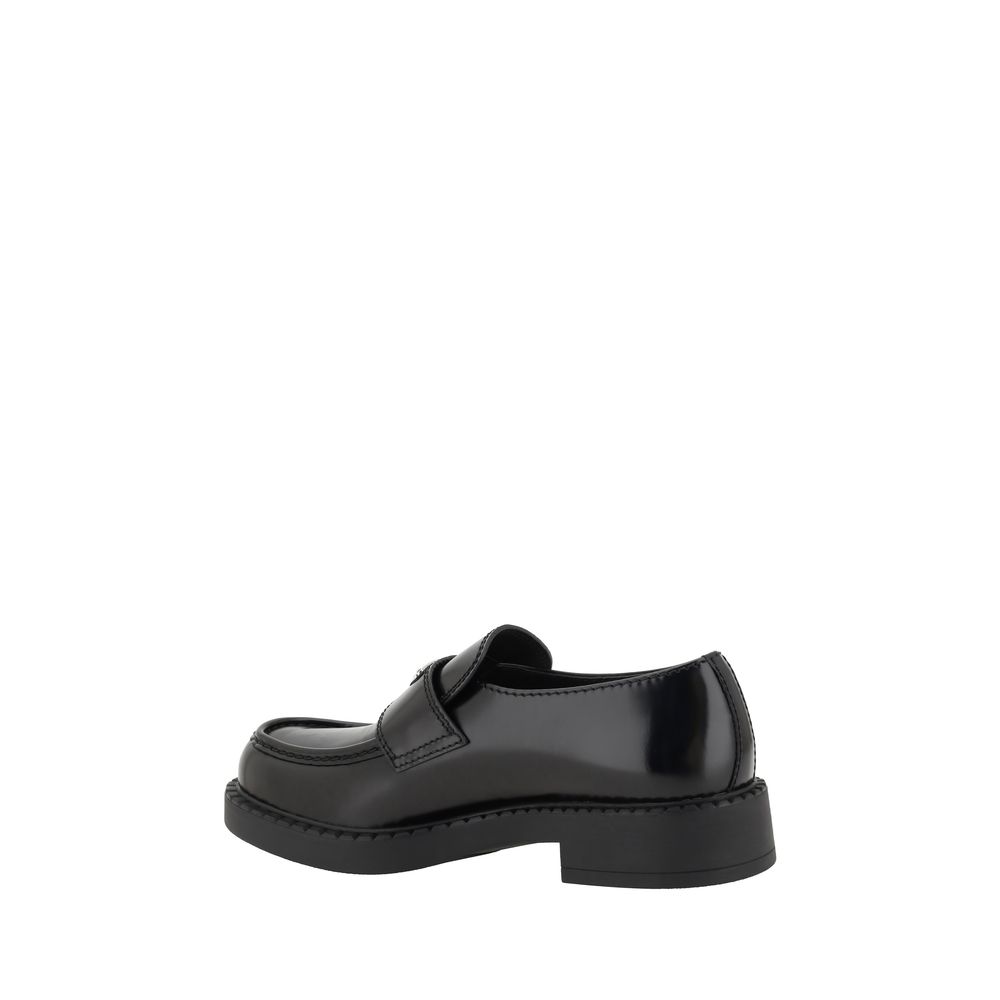 Prada Elegante schwarze Plateau-Loafer aus Gummi