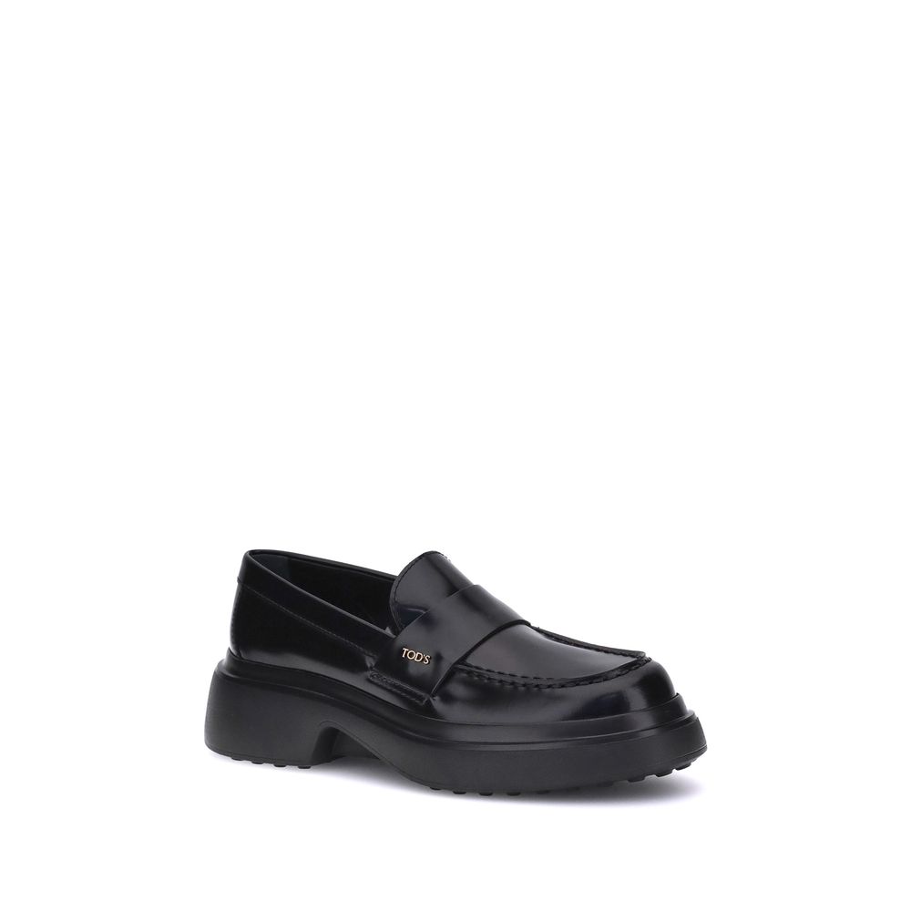 Tod's Elegante Plateau-Loafer aus schwarzem Gummi