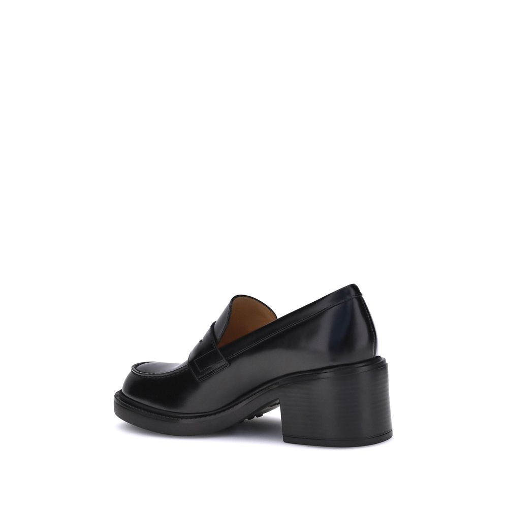 Tod's Schwarze Kalbshaut Bos Taurus Plateau-Loafer