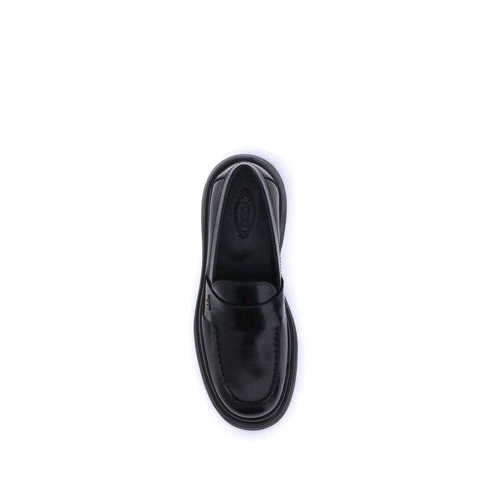 Tod's Elegante Plateau-Loafer aus schwarzem Gummi