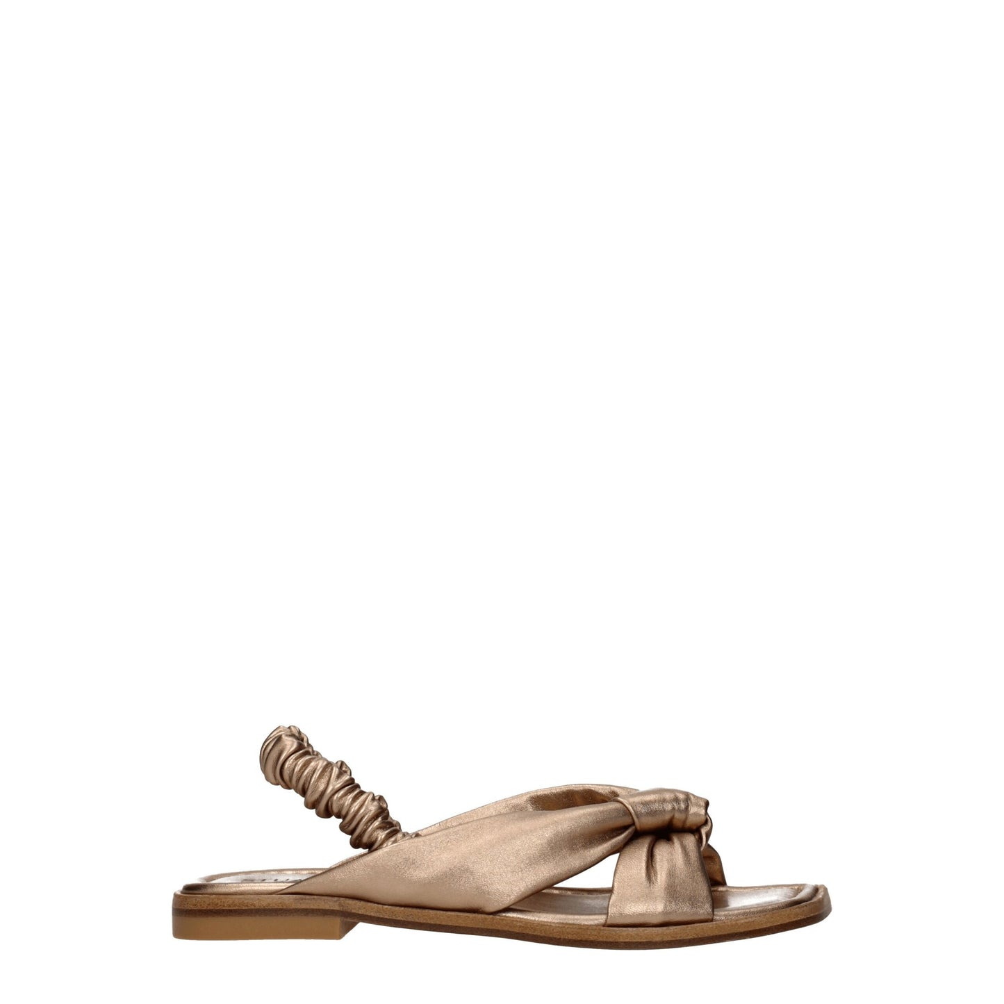 Stuart Weitzman Flache Sandalen aus Leder in Gold