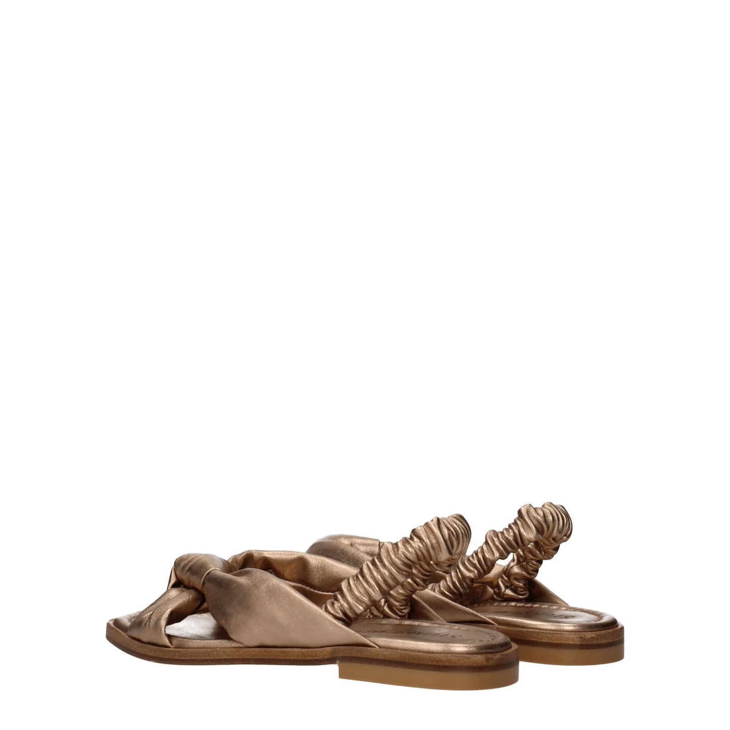 Stuart Weitzman Flache Sandalen aus Leder in Gold