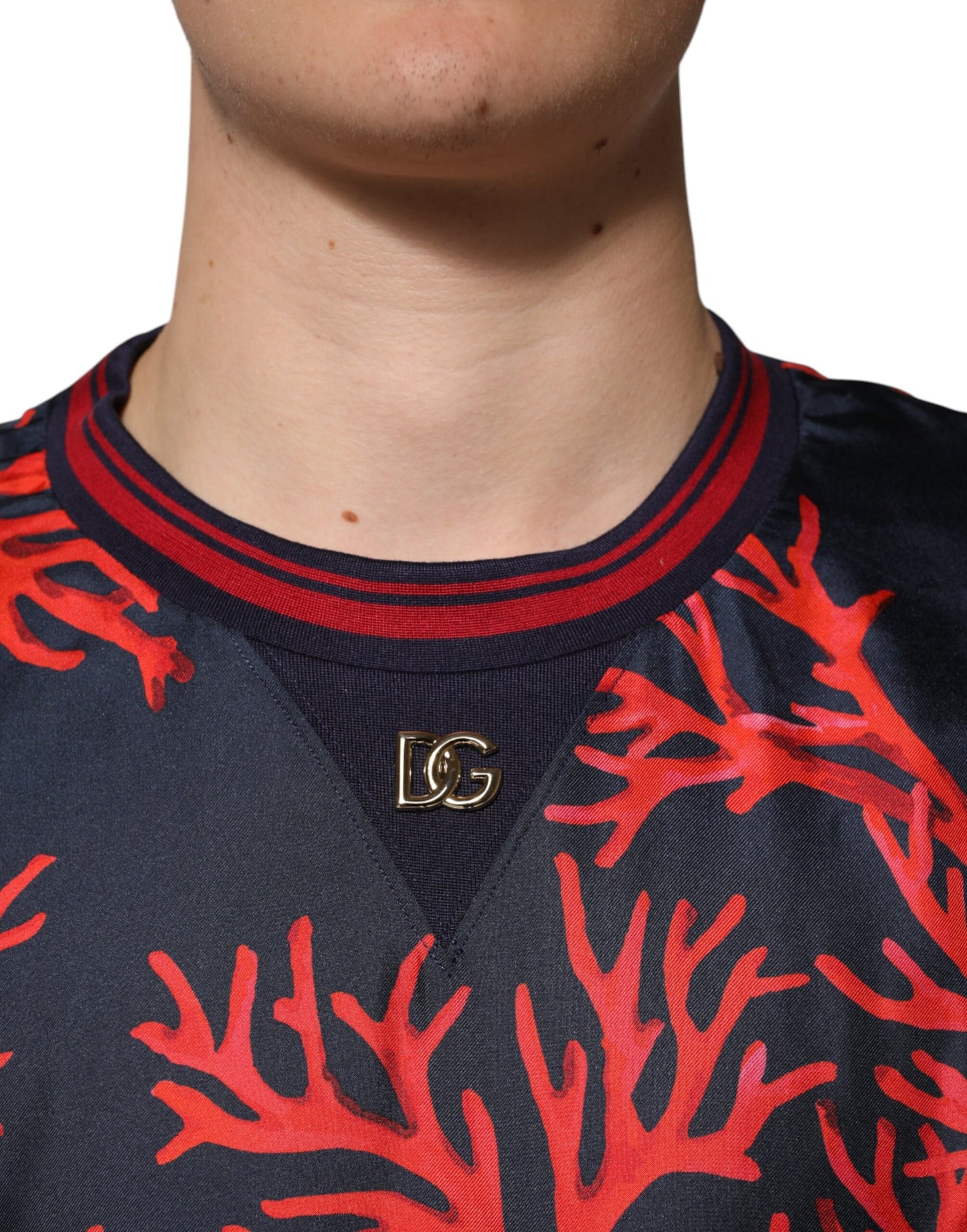 Dolce & Gabbana Marinefarbener Seidenpullover mit Korallendruck