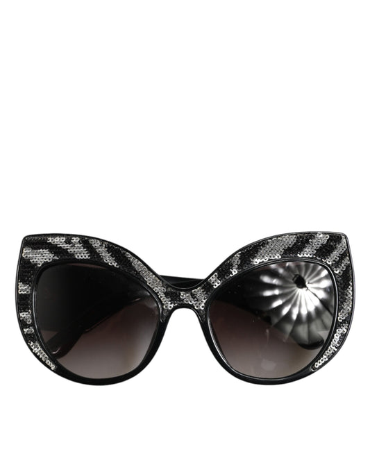 Dolce & Gabbana Sonnenbrille mit Schmetterlingsrahmen, Schwarz und Silber mit Pailletten