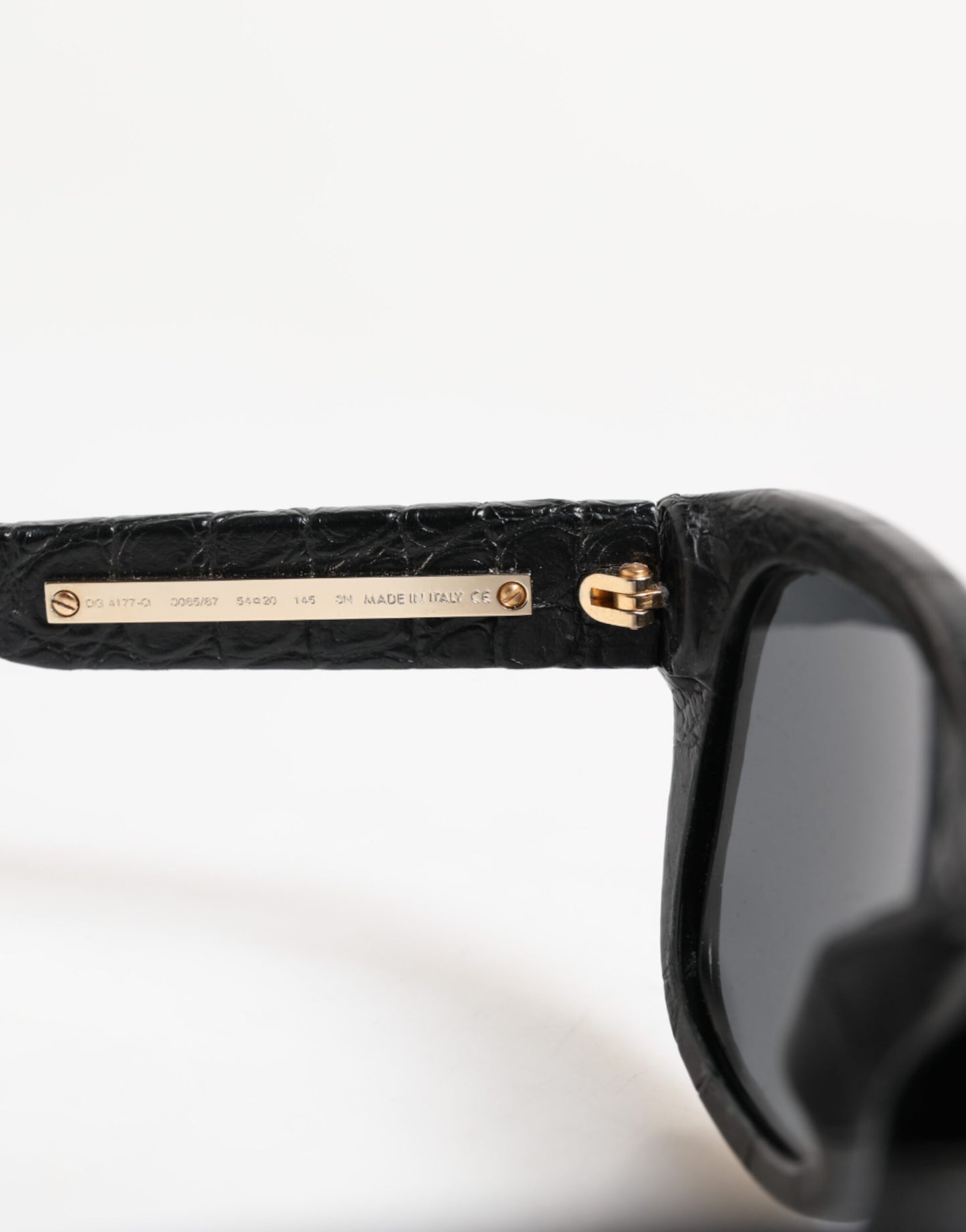 Dolce & Gabbana DG4177 Sonnenbrille mit Lederrahmen und getönten Gläsern